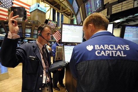 Corredores de bolsa en Wall Street. | Efe