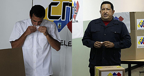 Capriles y Chávez, votando. | Reuters/AFP