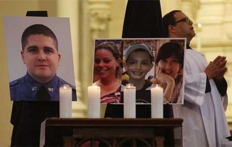Las cuatro víctimas de los Tsarnaev, en una misa en Boston. | Getty/AFP