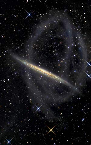Galaxia espiral rodeada de estrellas y restos de una galaxia enana. (Foto: EFE | IAC) Galaxia espiral rodeada de estrellas y restos de una galaxia enana. (Foto: EFE | IAC)