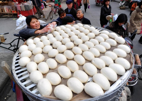 Venta de bollos en Xiangyang. | Reuters
