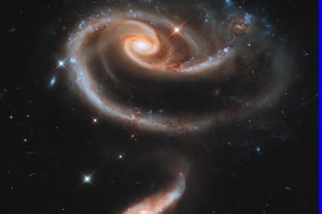 Las dos galaxias Arp 273, con forma de rosa.| NASA